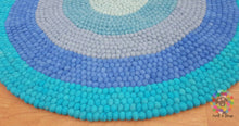 Load image into Gallery viewer, Felt Ball Rug. Ring Rug  Circular Stripe Pom pom nursery rug. 100 % Wool Carpet (Free Shipping)
