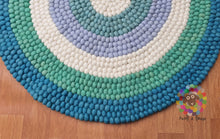 Load image into Gallery viewer, Felt Ball Rug. Ring Rug  Circular Stripe Pom pom nursery rug. 100 % Wool Carpet (Free Shipping)
